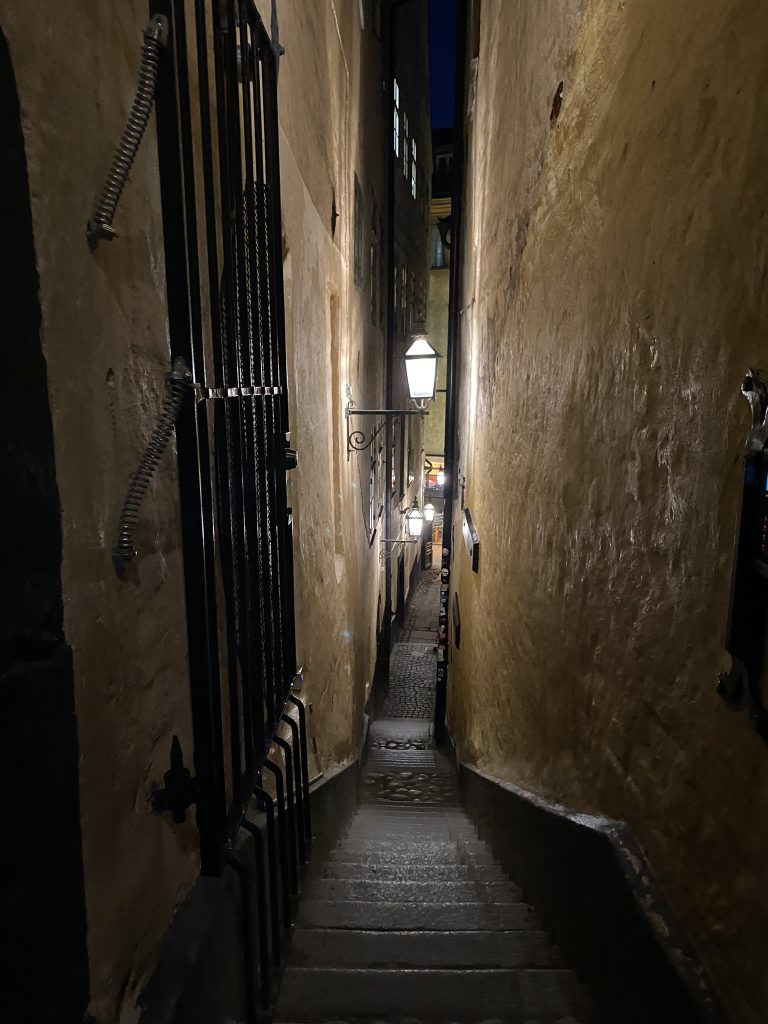 Stockholm in October narrow alleyway in Gamla Stan after dark