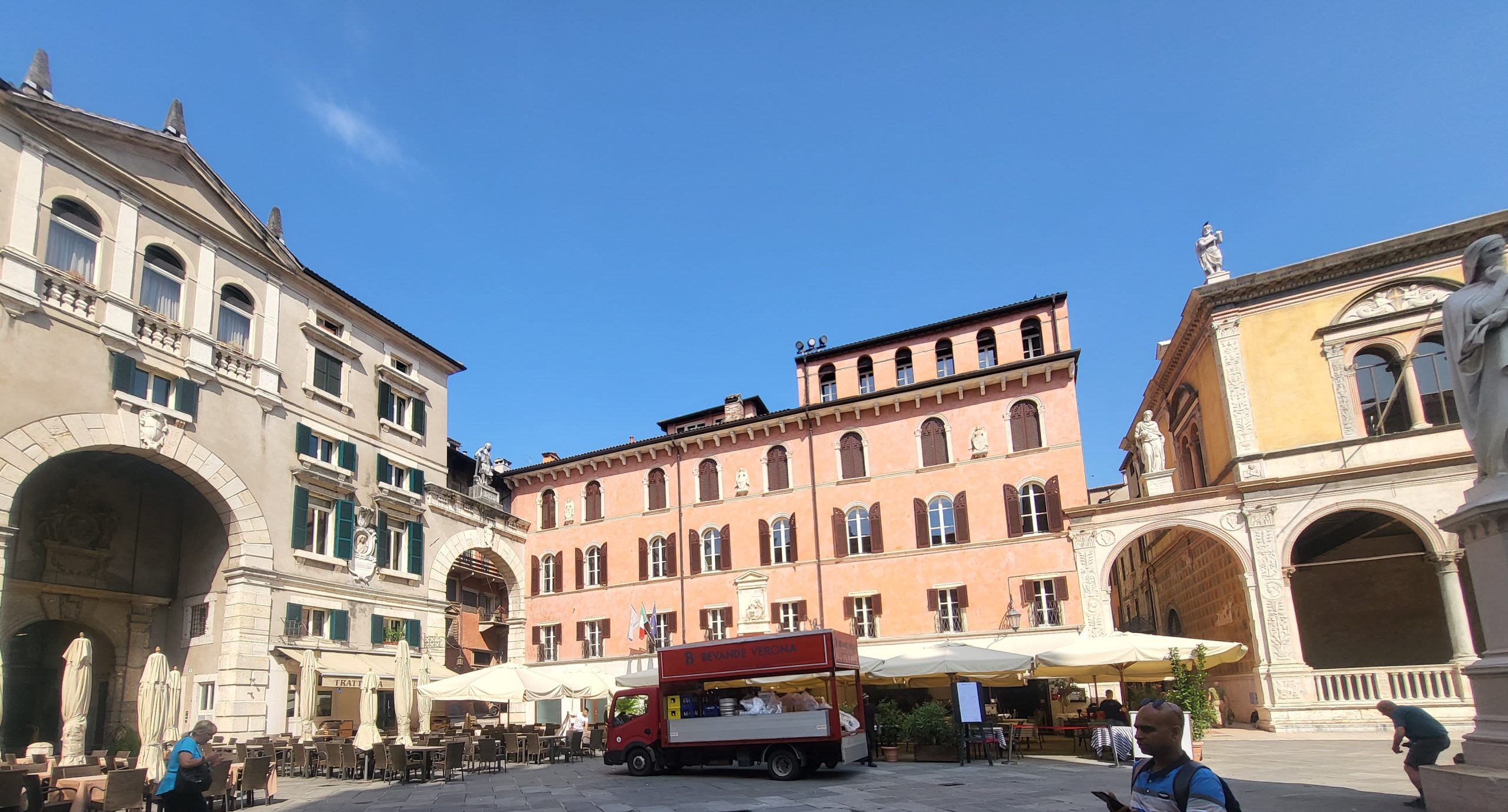 Colorful old European buildings as seen from the inside of a plaza in Verona 2 day romantic itinerary