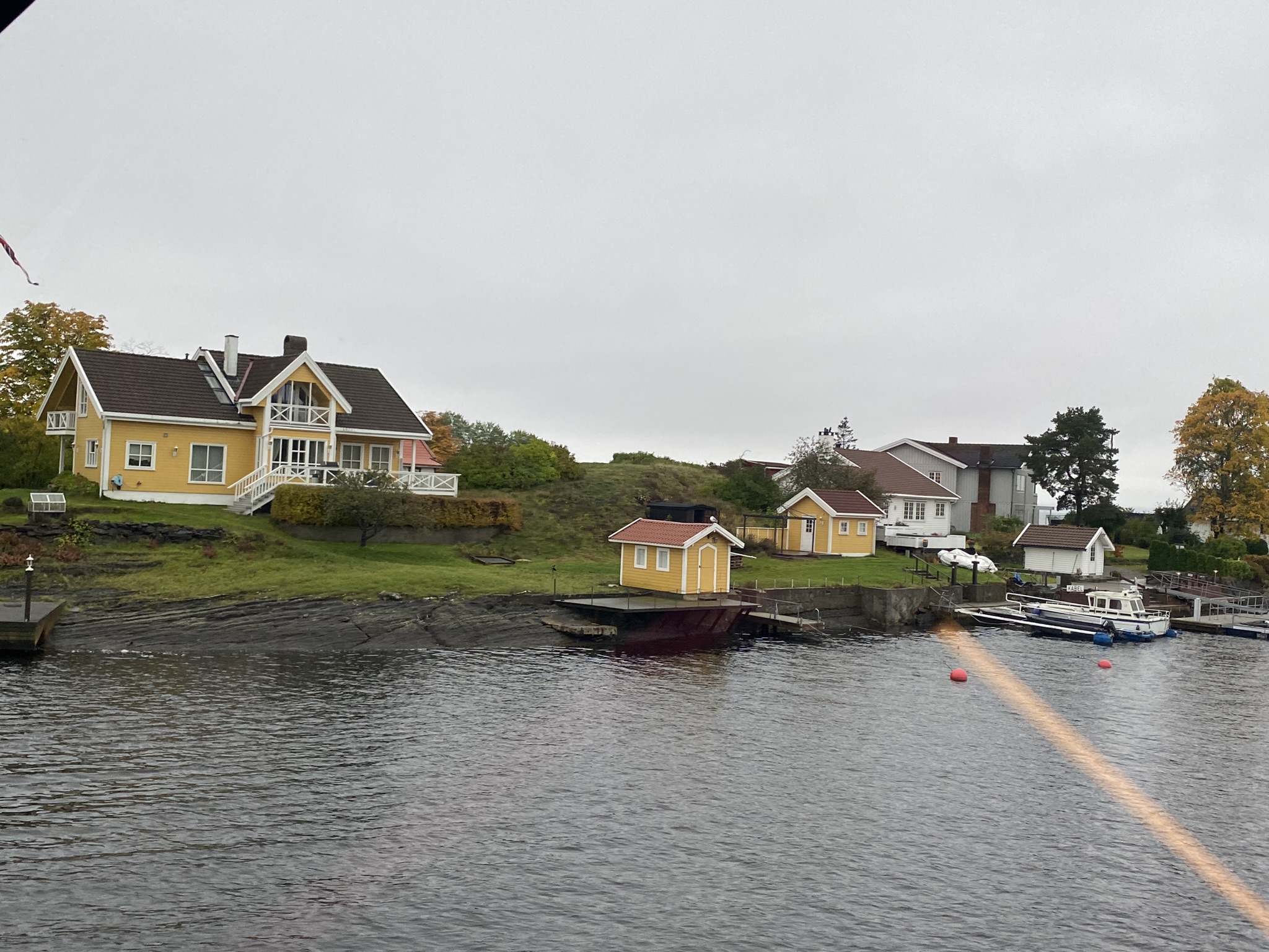 Several houses on a fjord in Oslo, Norway