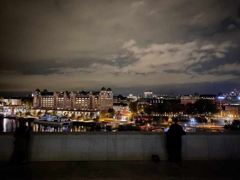 View of the Oslo skyline from the top of the Oslo opera house in Oslo after dark.