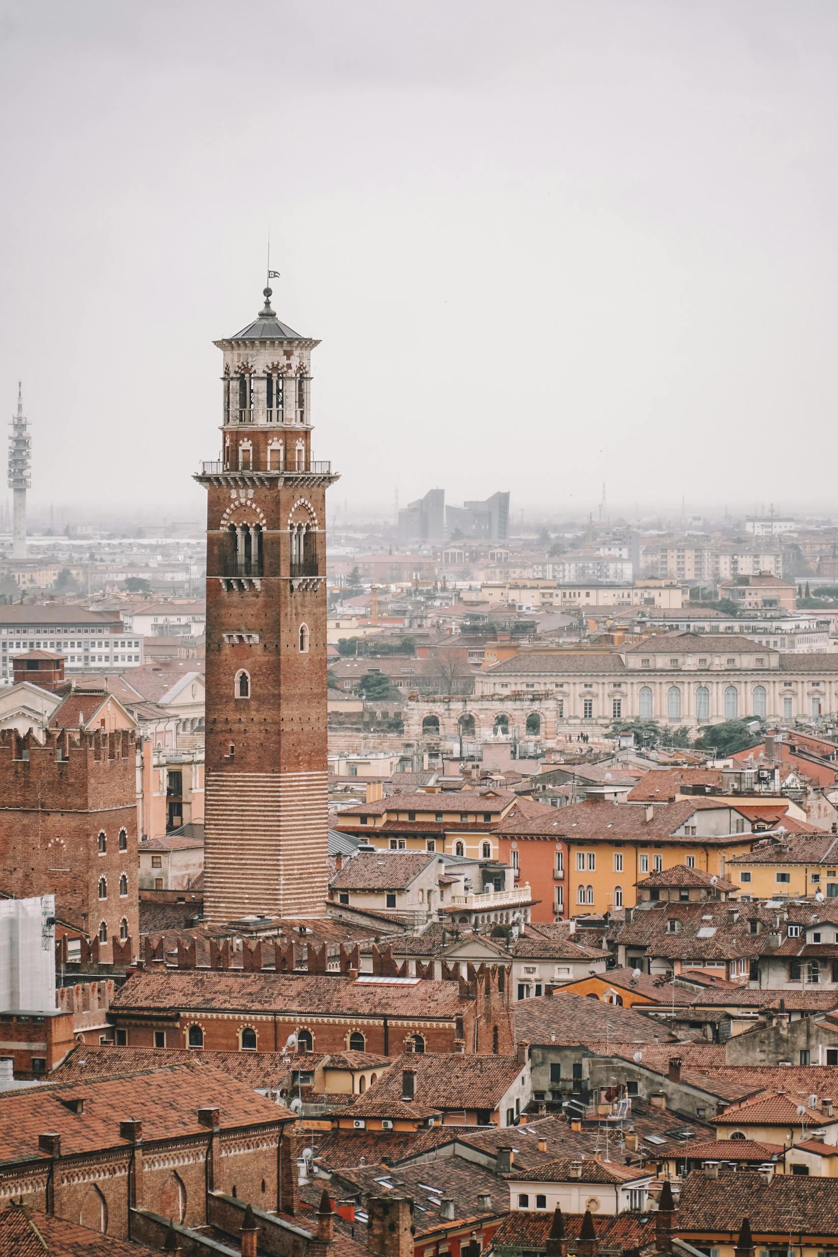 Aerial view highlighting Torre dei Lamberti and the historic cityscape of Verona, Italy.