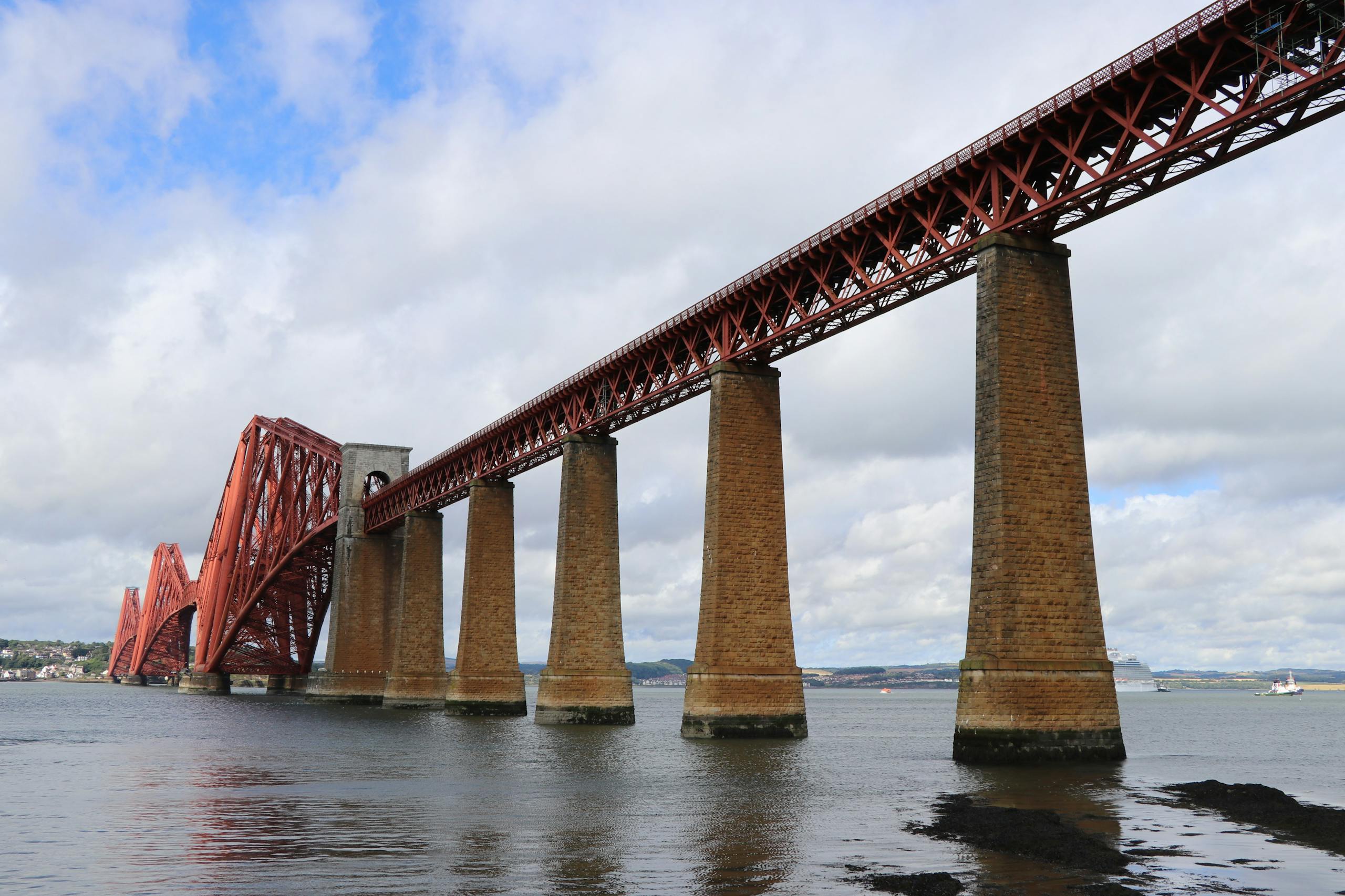 Captivating shot of the iconic Forth Bridge spanning the Firth of Forth in Scotland.
