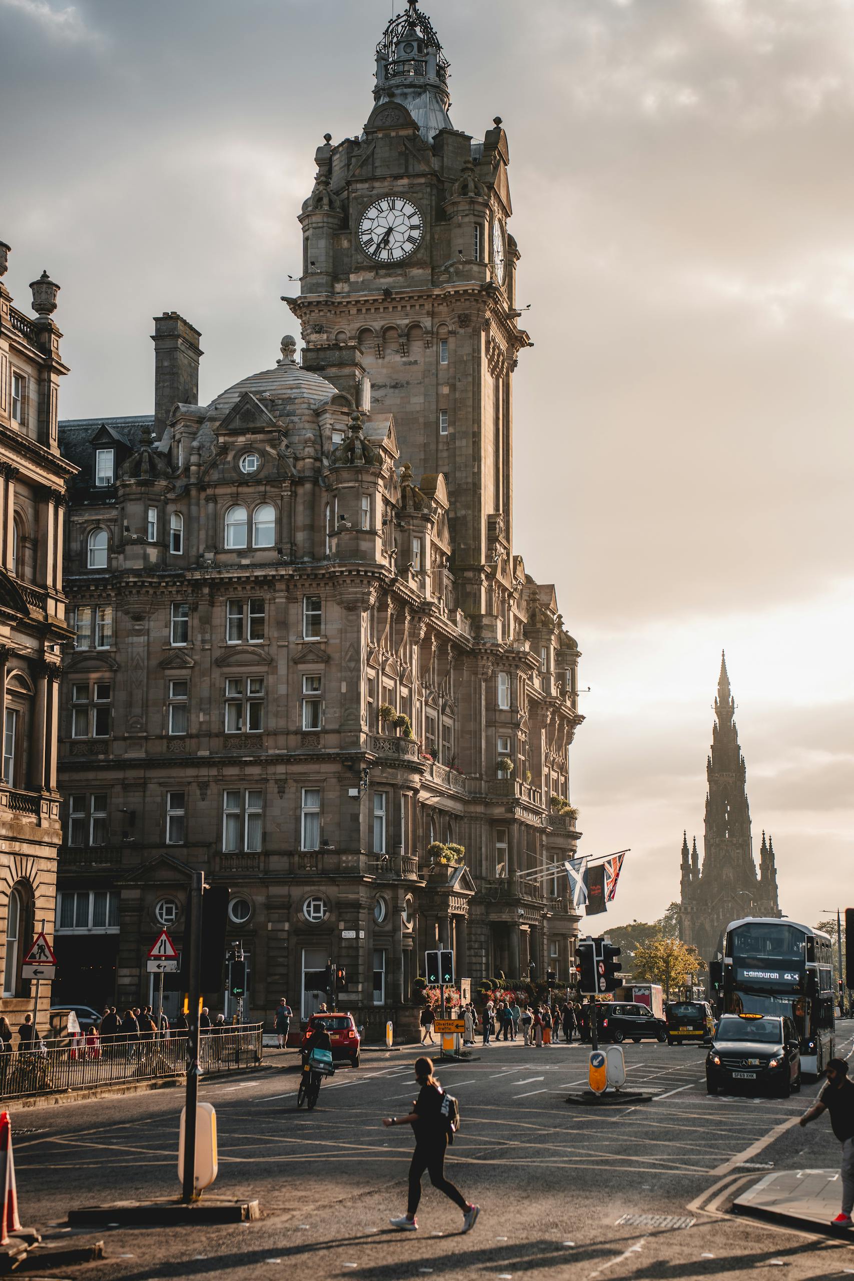 Iconic view of Edinburgh's Balmoral Hotel and Scott Monument at sunset in 21 cheap things to do in Edinburgh