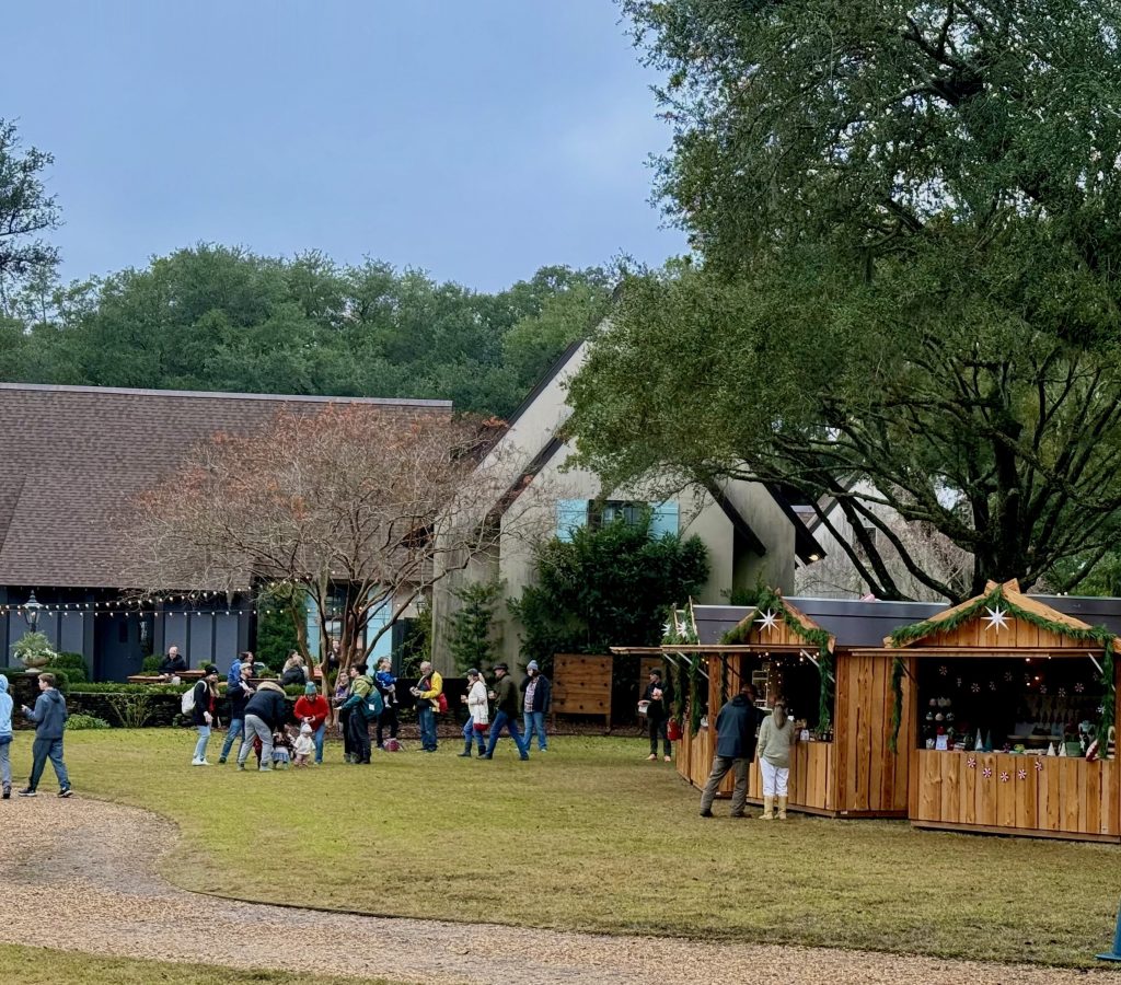 Christmas Market in Charleston with chalets and people in the best Christmas events in Charleston