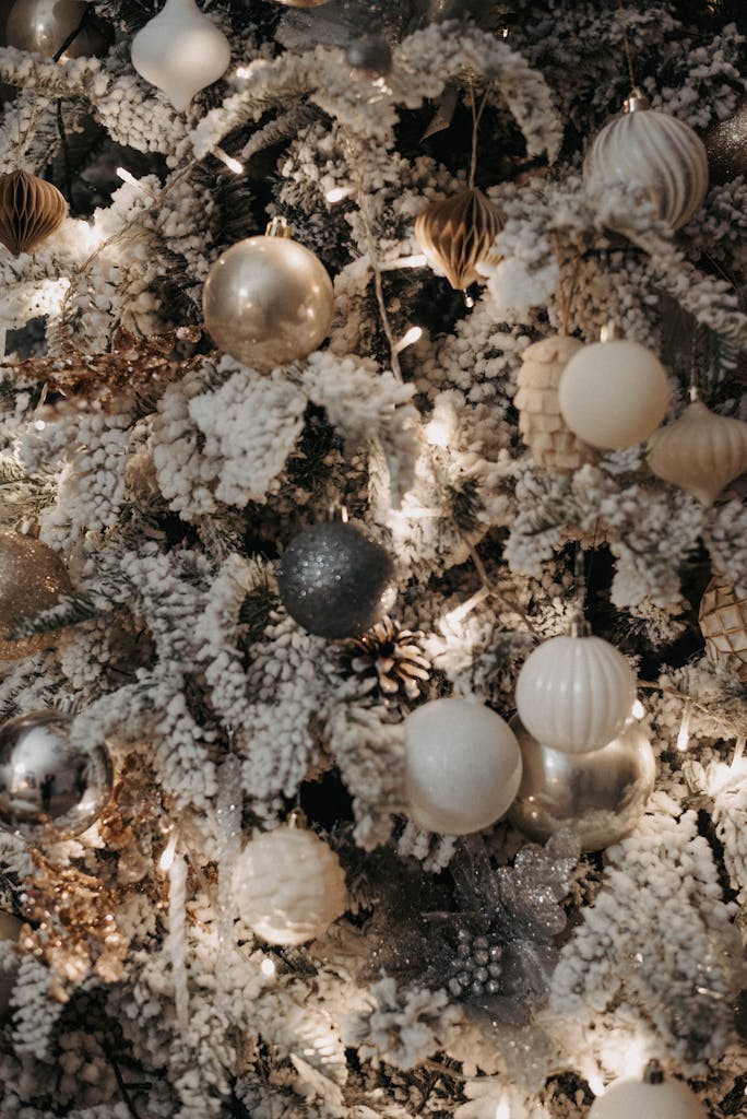 Luxurious Christmas tree with silver and white ornaments for festive decor in Christmas date ideas in Charleston, SC