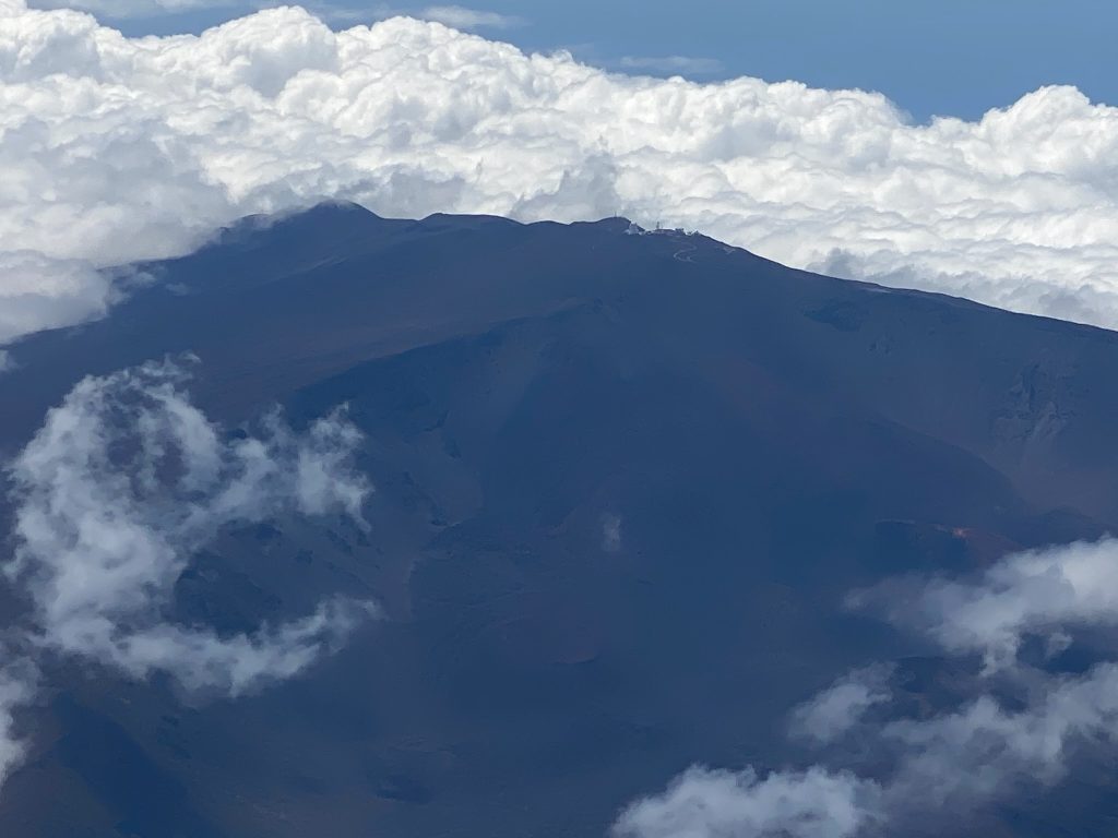 The observation set up on top of the mountain as seen from a plane flying above Hawai'i