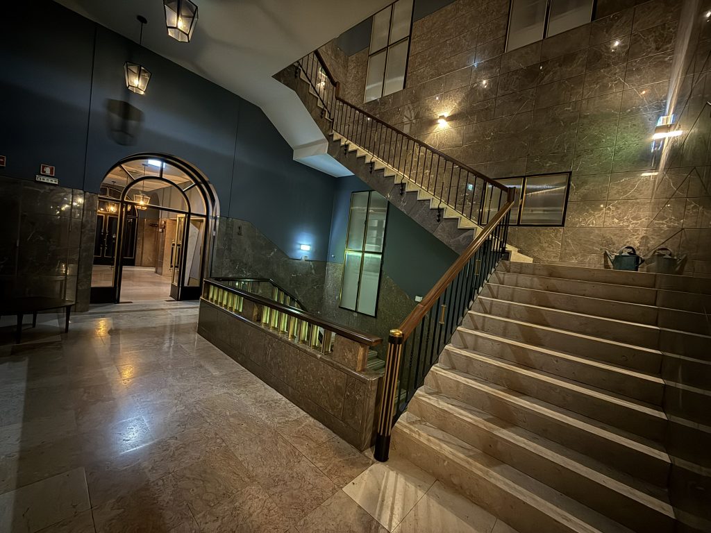 The Editory Riverside Santa Apolonia Hotel in Lisbon, Portugal- a view of the steps going down to the lobby
