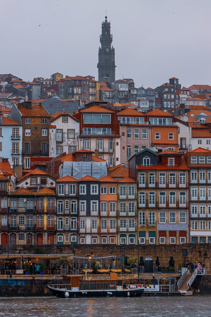 Scenic view of Porto's Ribeira District showcasing colorful historic buildings along the Douro River in Porto, Portugal