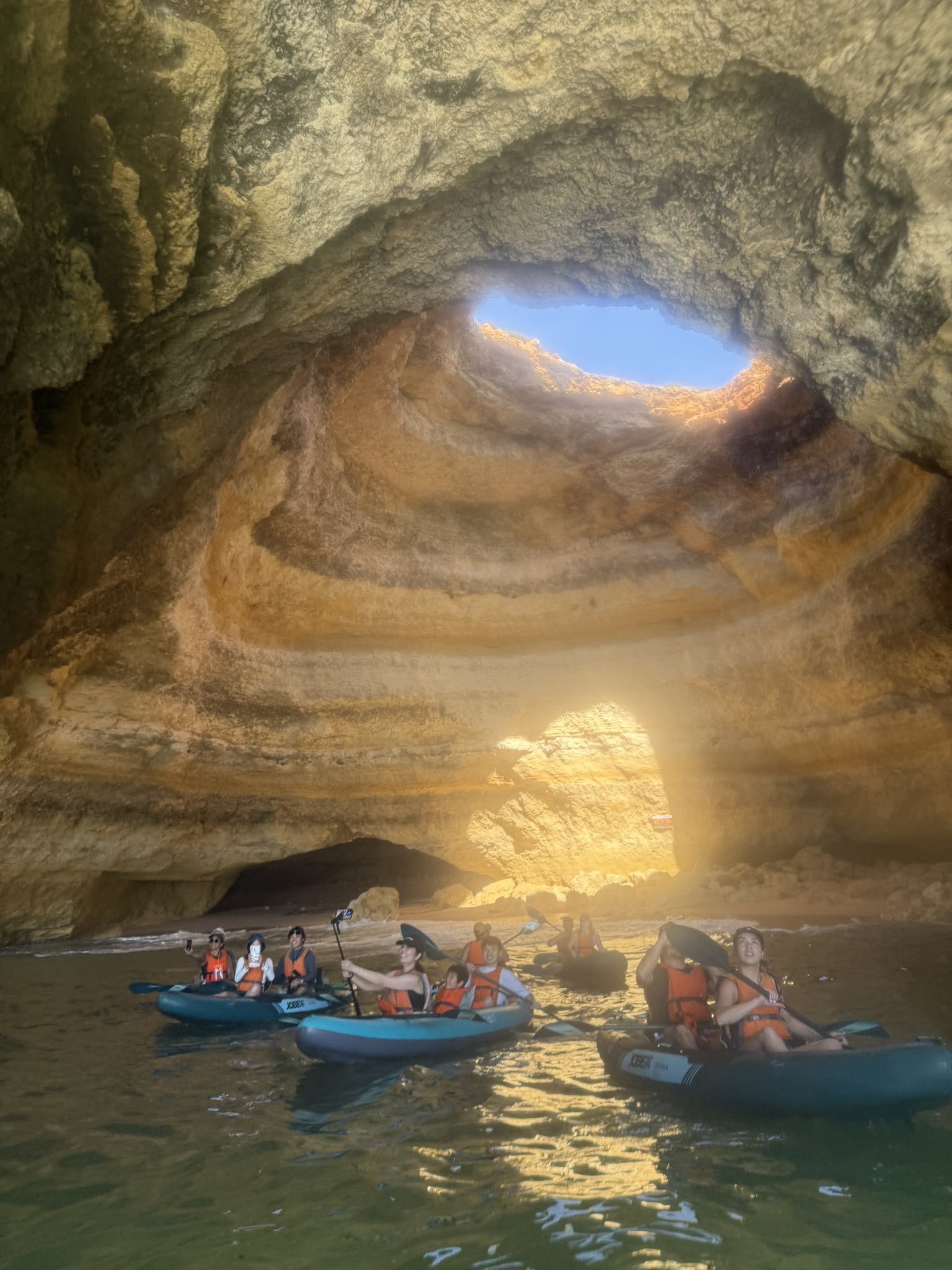 Kayakers in the Bengail Caves in Algarve, Portugal on spring break in the algarve