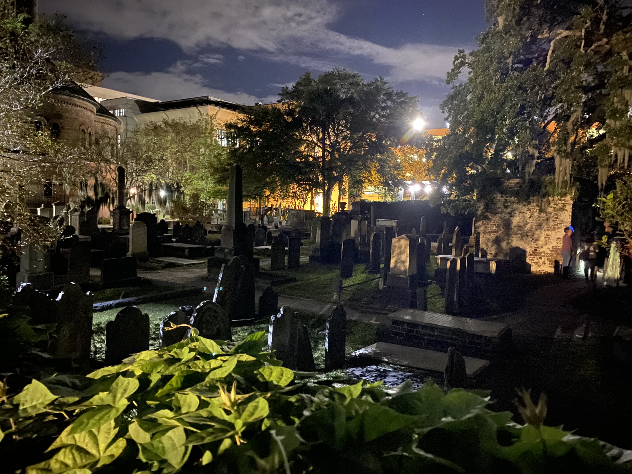 An old graveyard in historic Charleston, South Carolina as seen at night on a ghost tour on Spring Break in Charleston