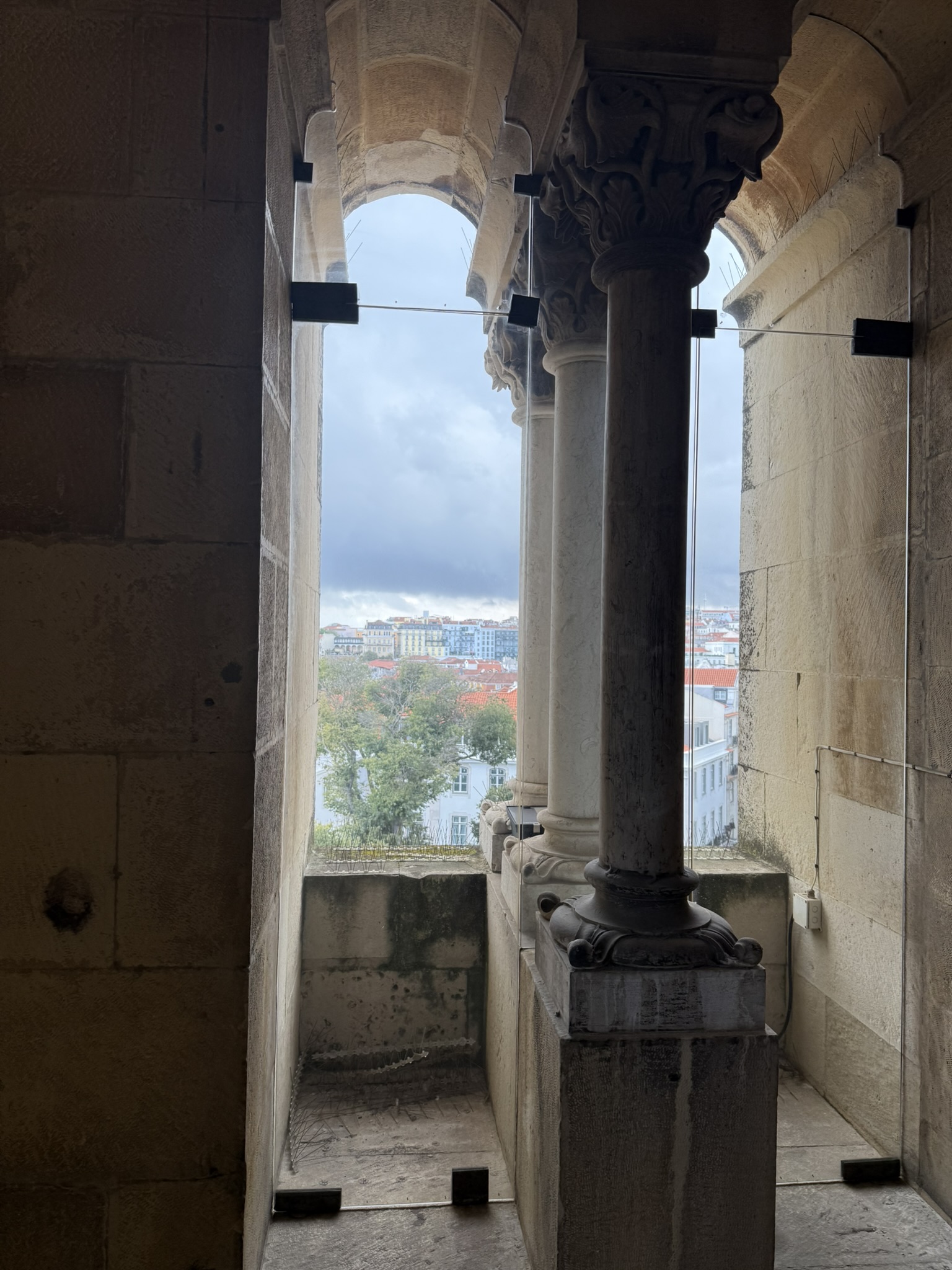 A view of the Tagus through the window of the cathedral in Lisbon, Portugal as seen near the best hotels in Lisbon for couples