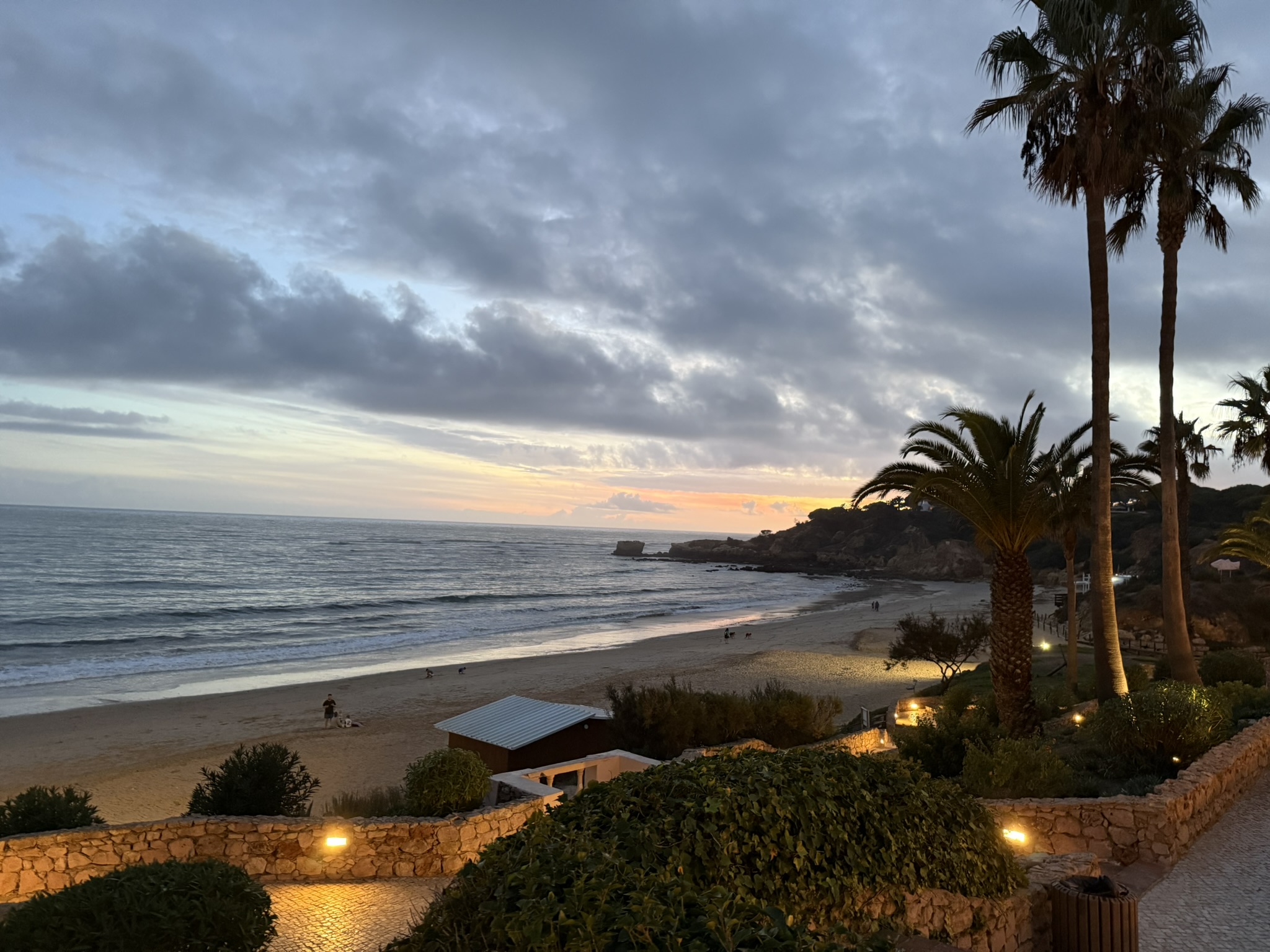 Beautiful picture of the sun setting over the ocean in Albuferia in the Algarve region of Portugal as seen in spring break in the Algarve