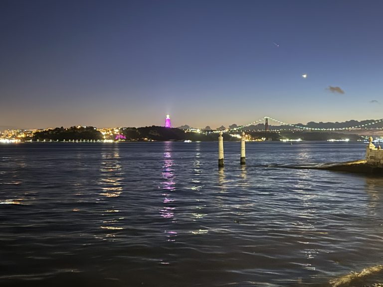 A beautiful view of the Tagus River right after the sun has set in Lisbon, Portugal as seen in best hotels in Lisbon with a river view