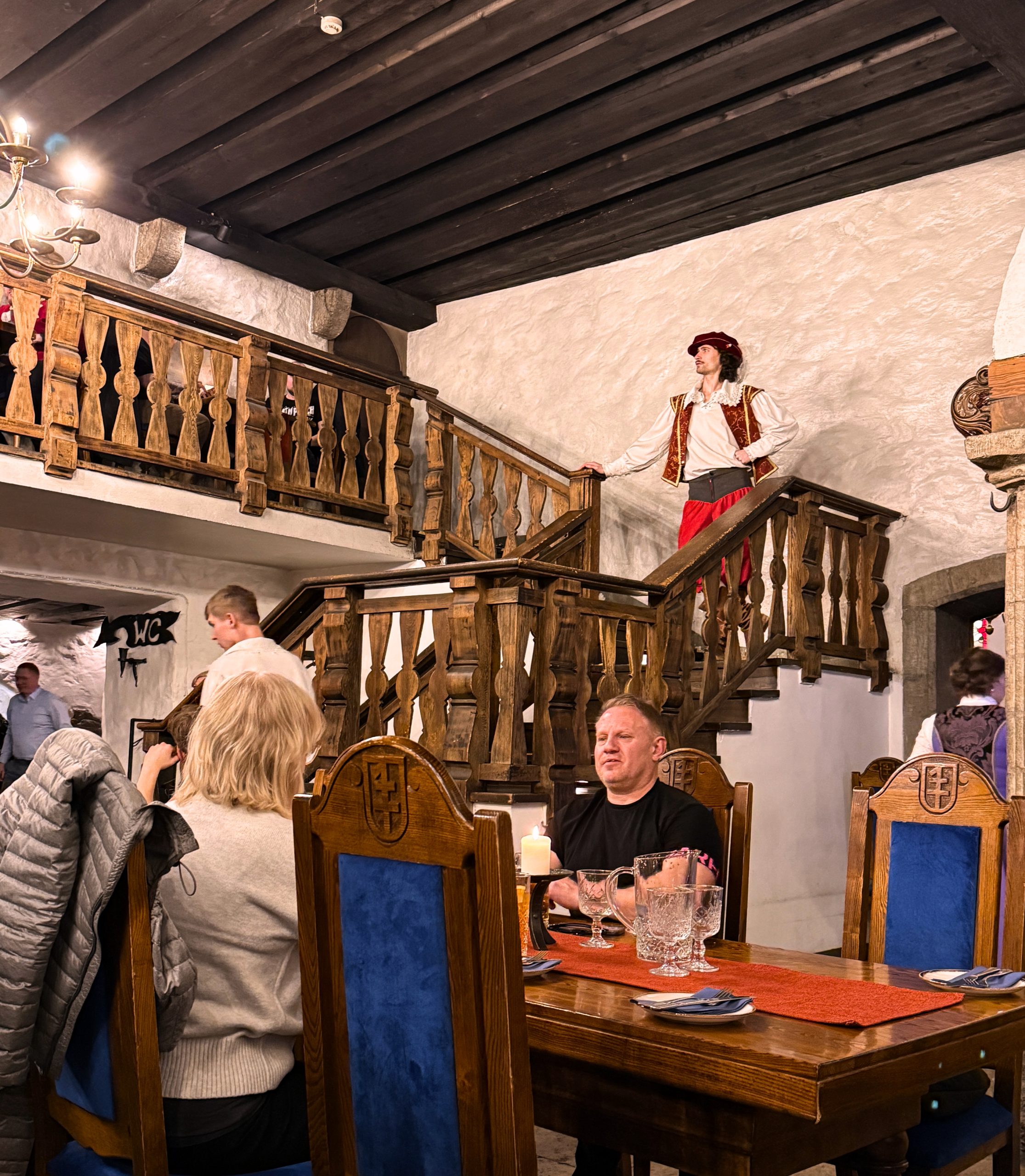Employees putting on a short production inside the Pepper Sack during dinner on the 2 days in Tallinn itinerary