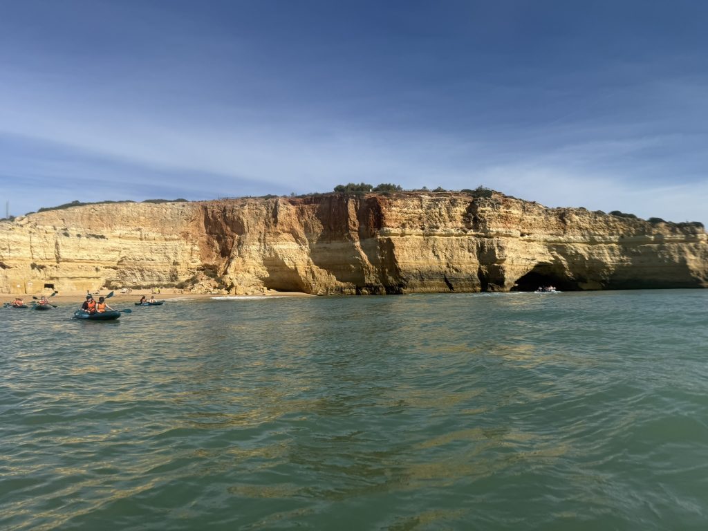 Cliffs near Benagil Cave in the best Algarve resorts in Portugal as seen from the water on a sunny day