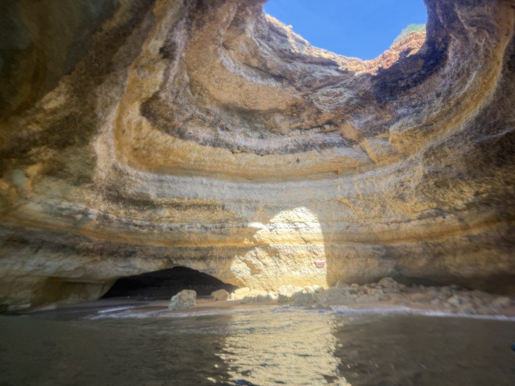 Benagil Cave in the Algarve region of Portugal as seen from the inside as seen from a kayak while finding the best Algarve resorts.