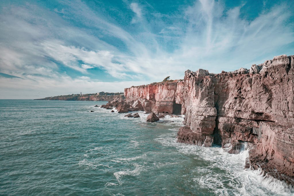 Beautiful seascape featuring cliffs and the Atlantic Ocean along Portugal's picturesque coastline.