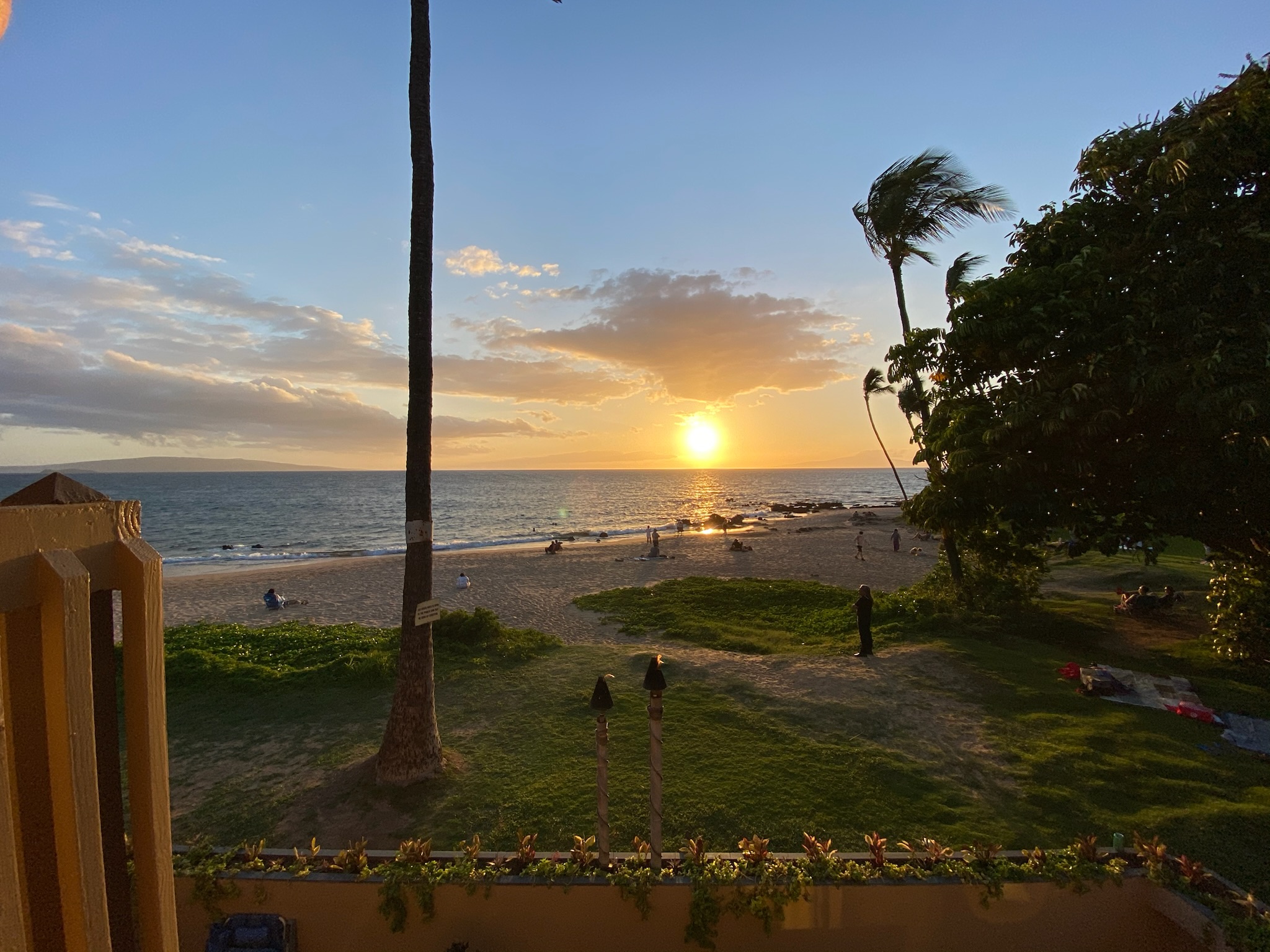 Enjoying the sunset over the ocean as we are taking a walk on the beach in Maui, Hawaii the best things to do in Maui for couples