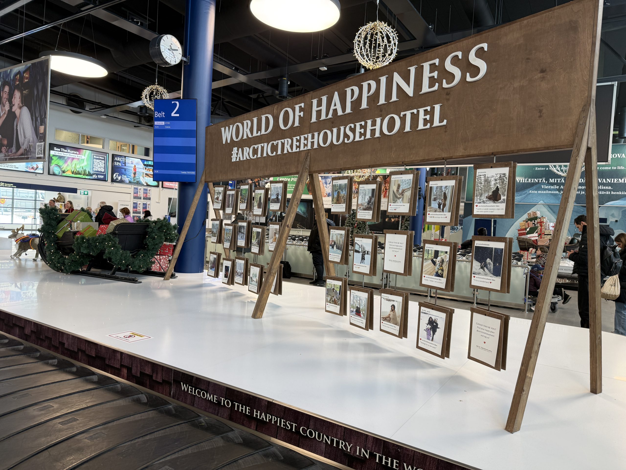 Where is Lapland? It is the World of Happiness as seen on a sign at the Rovaniemi airport in Lapland, Finland