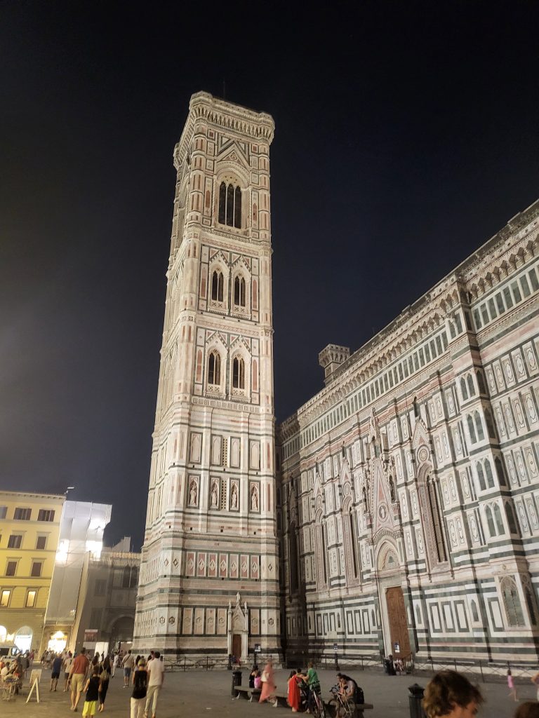 Walking through Florence, Italy on an excursion to see the hidden gems of Florence we came across the Giotto which is an old tower that looked almost white against the night sky.