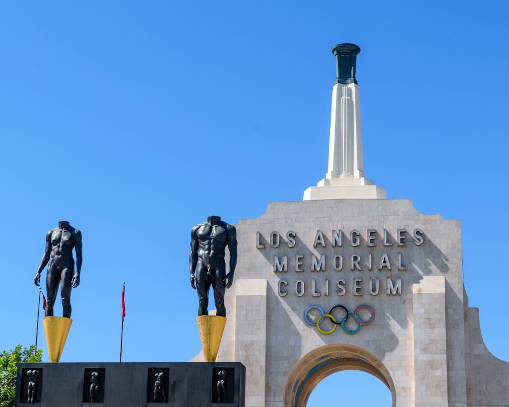 Iconic entrance of Los Angeles Memorial Coliseum capturing its historic architecture and Olympic legacy.