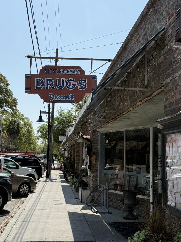 View of the Pitt St. Pharmacy Drug Store sign and the street in the Old Village in Mount Pleasant, South Carolina very close to Charleston, SC