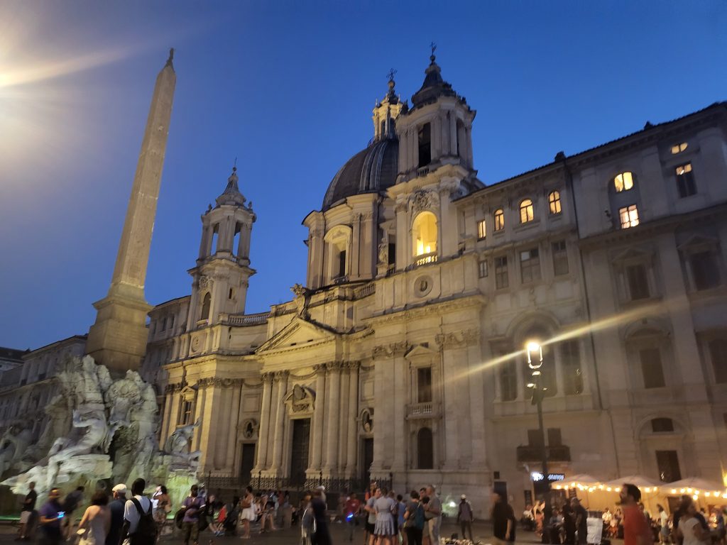 In how many days in Rome, Italy, the Piazza Navona by the Fountain of Four Rivers on a hot summer night