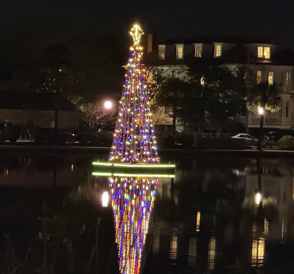 Colonial Lake in Charleston, South Carolina at Christmastime, with a lite Christmas tree in the middle of the lake