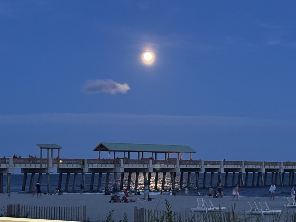 Folly Beach located close to Charleston, South Carolina in the evening under a full moon