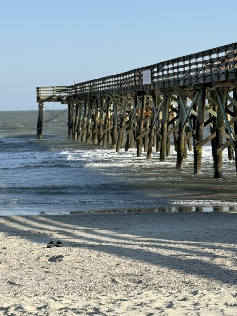 Pier going into the ocean at Folly Beach near Charleton, South Carolina