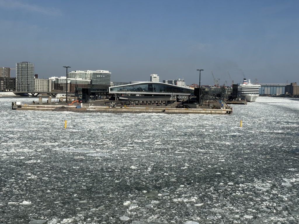 Helsinki as seen from the icy Gulf of Finland when crossing over the water by boat from Estonia in March