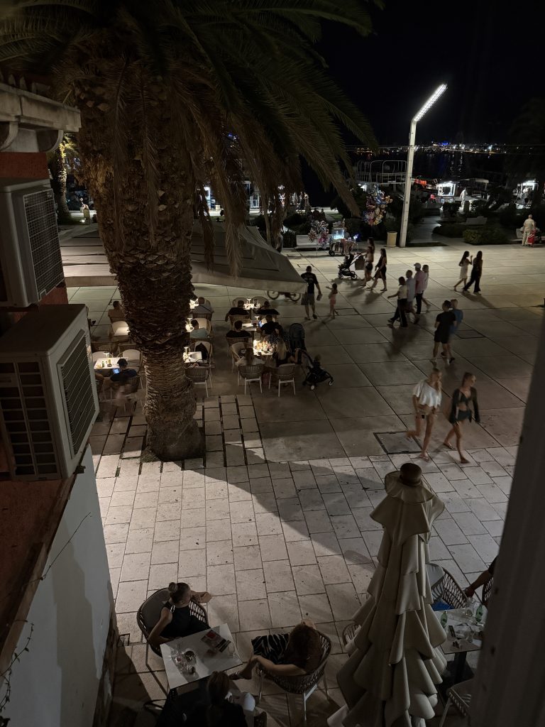 Looking down from our sea-view hotel room onto the Riva Promenade at night in Split
