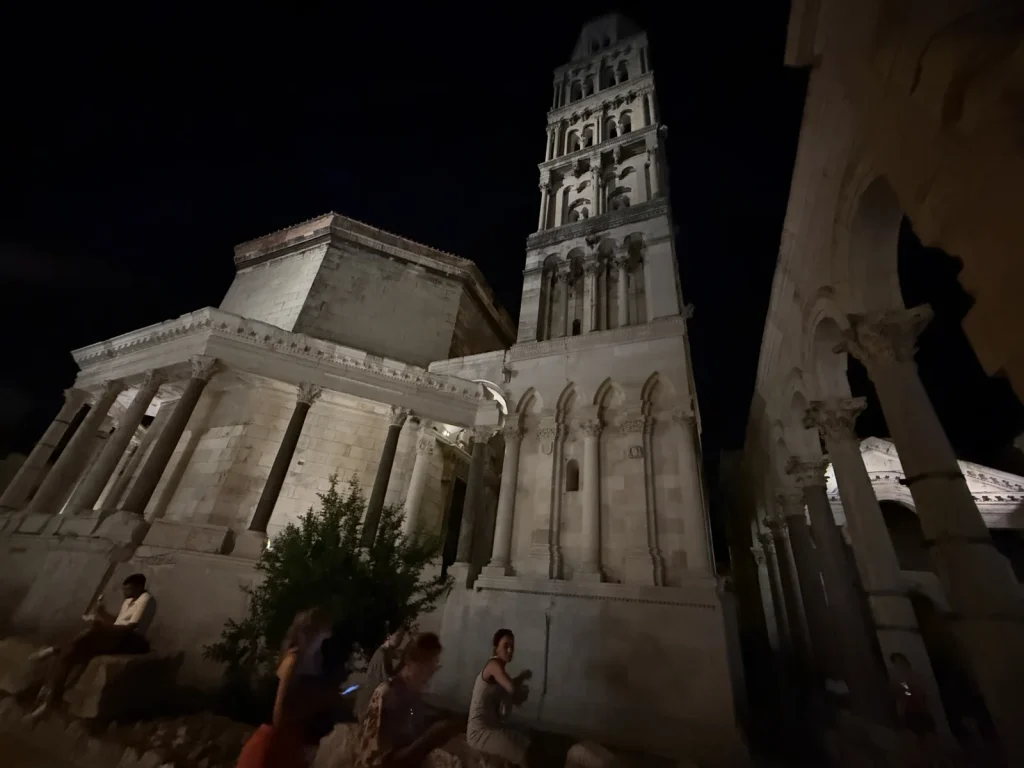 Cathedral of St. Domnius and its bell tower lit up at night above the Peristyle in Diocletian's Palace